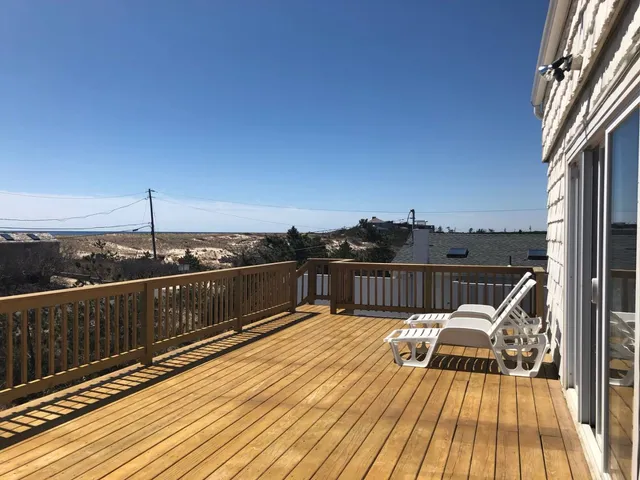 a view of balcony with furniture
