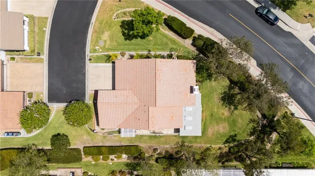 an aerial view of a highlighted house