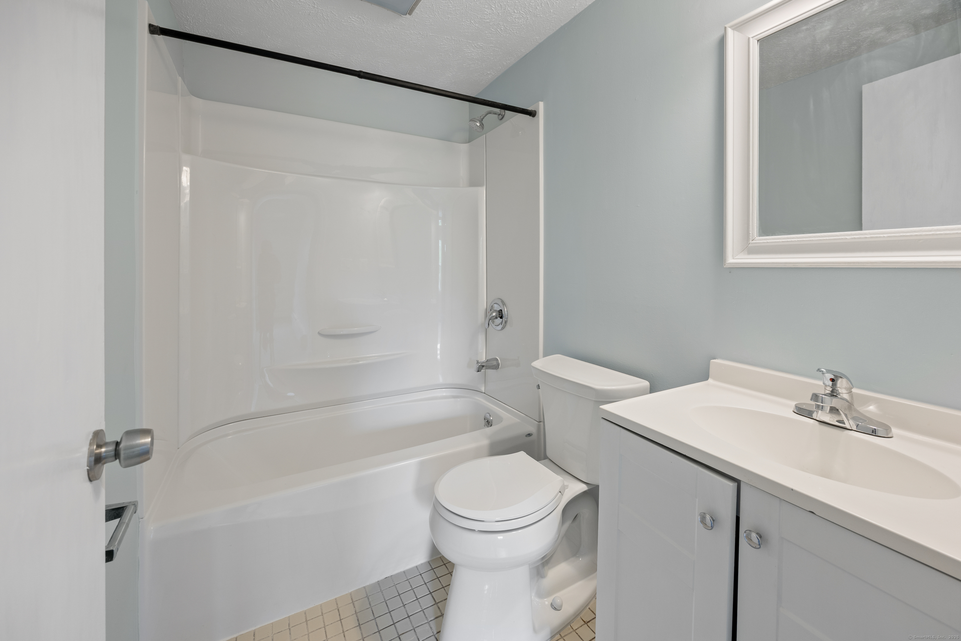 9 Guiel Place, Unit 1 Meriden, CT 06450 - Photo 11 of 15 a bathroom with a sink a toilet and a bathtub