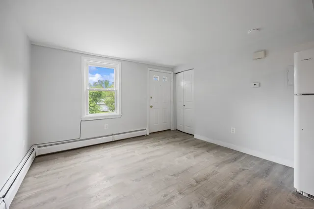 an empty room with windows