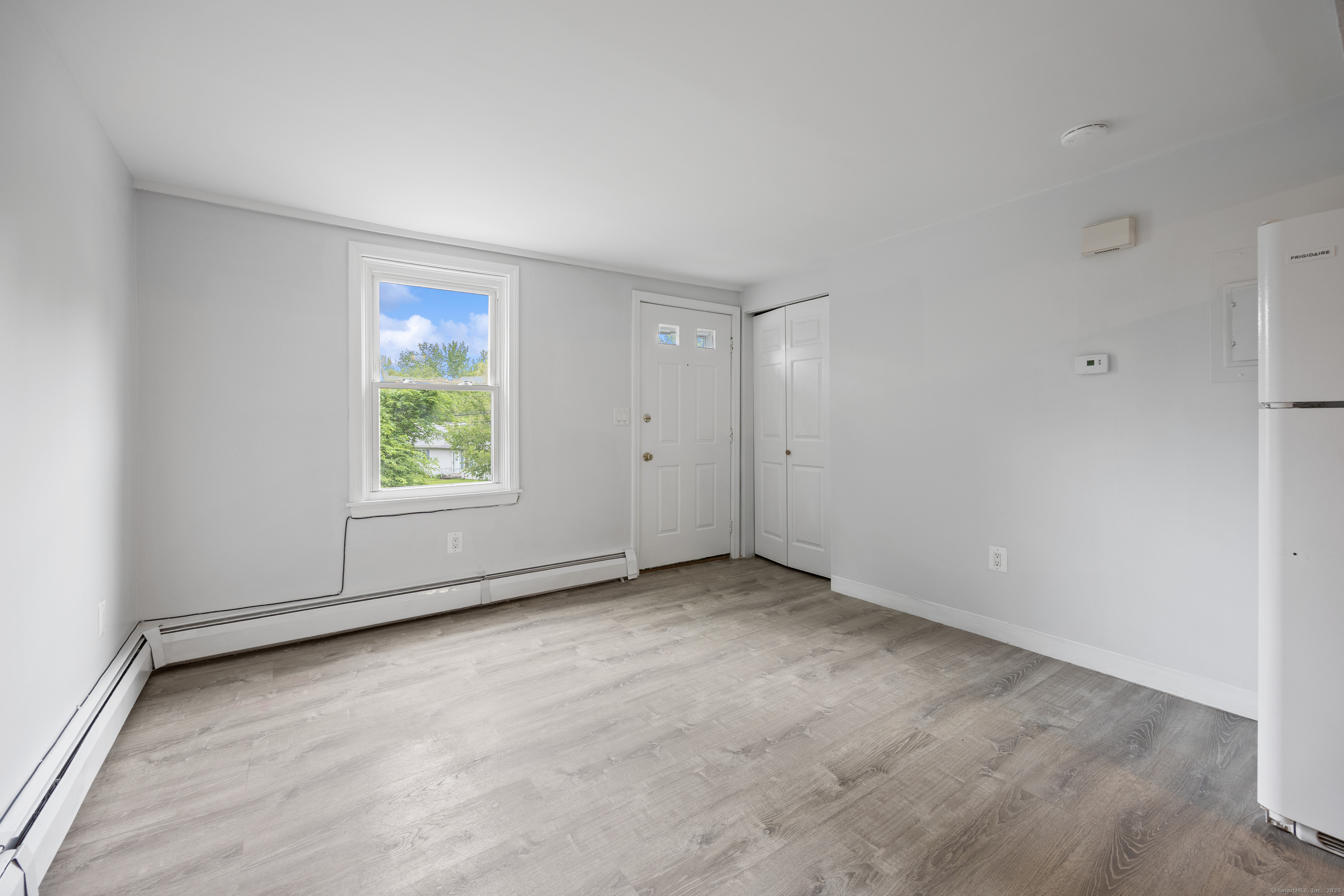 9 Guiel Place, Unit 1 Meriden, CT 06450 - Photo 5 of 15 an empty room with windows