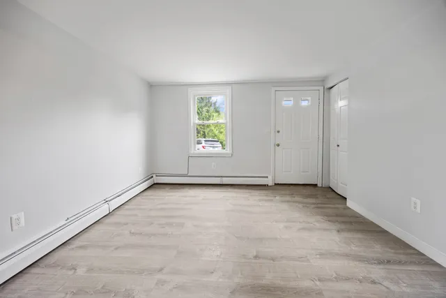 an empty room with windows