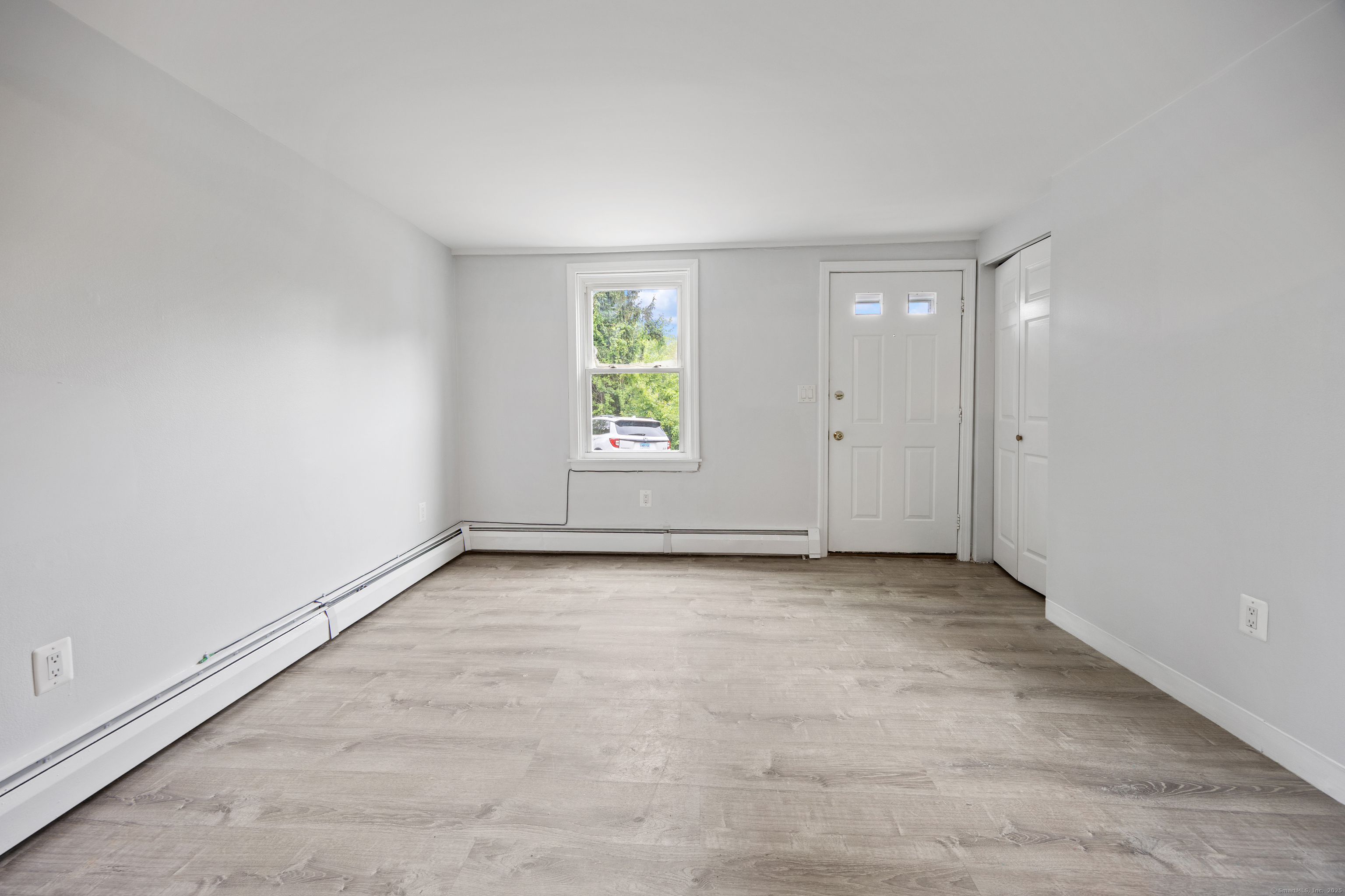 9 Guiel Place, Unit 1 Meriden, CT 06450 - Photo 6 of 15 an empty room with windows