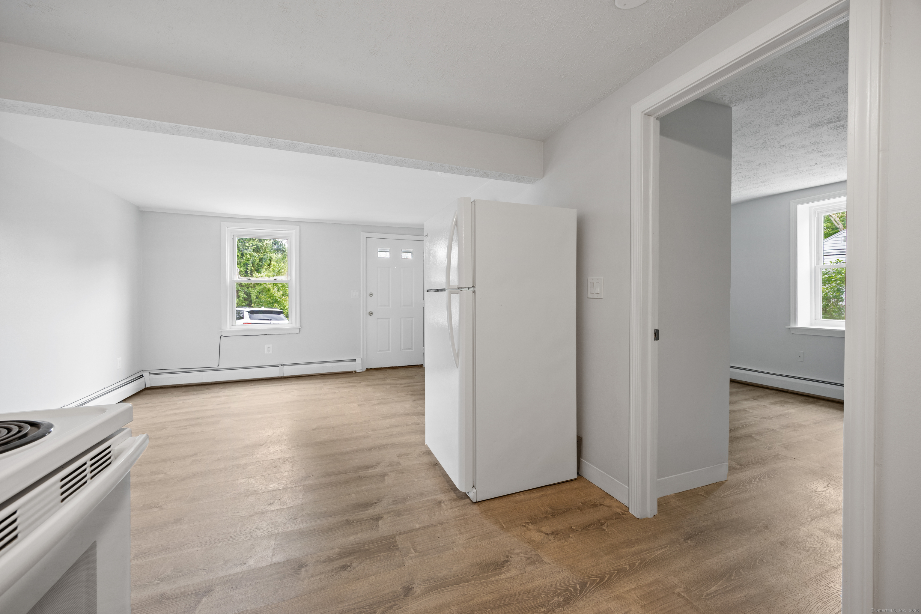 9 Guiel Place, Unit 1 Meriden, CT 06450 - Photo 7 of 15 an empty room with windows and closet