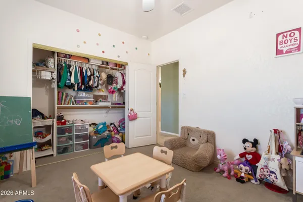 a room with furniture and a flat screen tv
