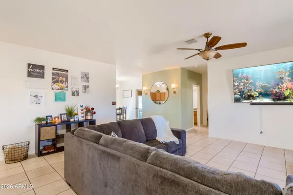 a living room with furniture and a rug