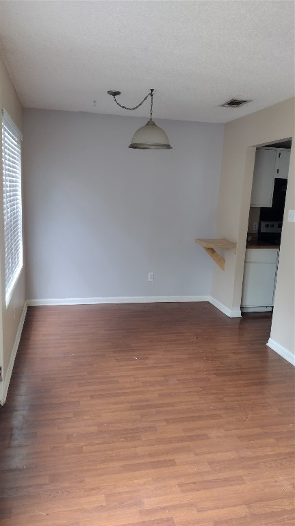 10001 Parliament House Road, Unit A Austin, TX 78717 - Photo 6 of 19 a view of room with wooden floor and window