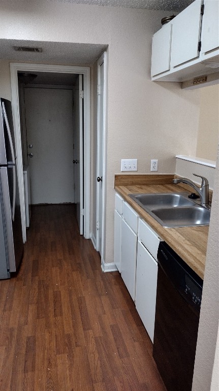 10001 Parliament House Road, Unit A Austin, TX 78717 - Photo 7 of 19 a kitchen with a sink and wooden floor