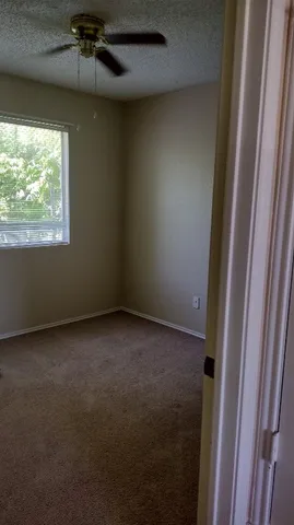 a view of a livingroom with a window