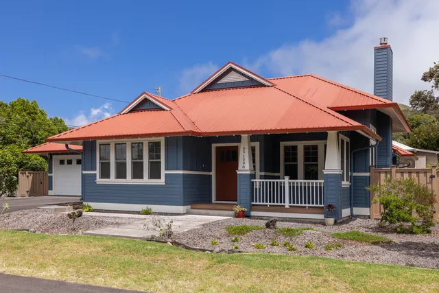 a front view of a house with swimming pool