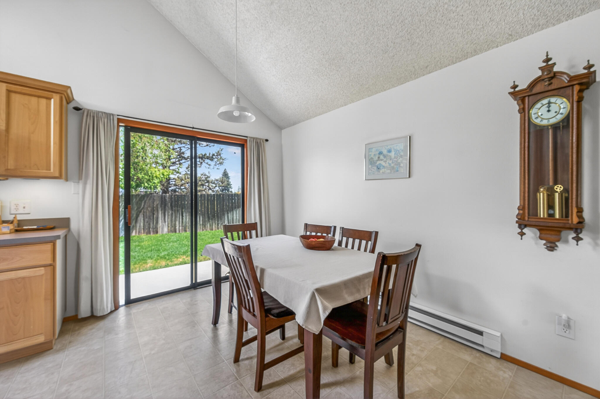 60866 Brosterhous Road Bend, OR 97702 - Photo 11 of 41 a view of a dining room with furniture window and outside view
