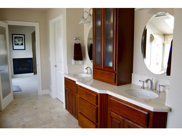18 Ashdown Place Half Moon Bay, CA 94019 - Photo 14 of 23 a bathroom with a double vanity sink and mirror