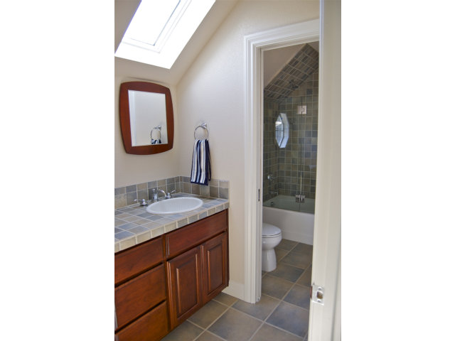 18 Ashdown Place Half Moon Bay, CA 94019 - Photo 17 of 23 a bathroom with a toilet sink and mirror