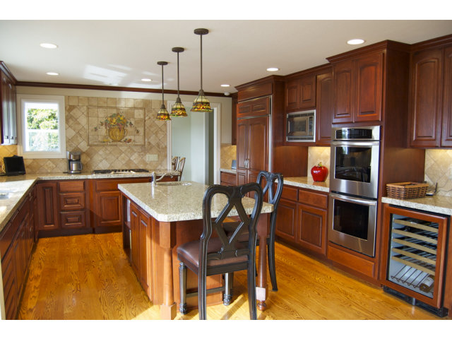 18 Ashdown Place Half Moon Bay, CA 94019 - Photo 3 of 23 a kitchen with stainless steel appliances granite countertop a sink a stove and a refrigerator