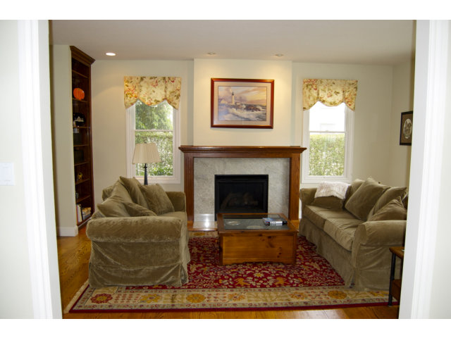 18 Ashdown Place Half Moon Bay, CA 94019 - Photo 6 of 23 a living room with furniture and a fireplace