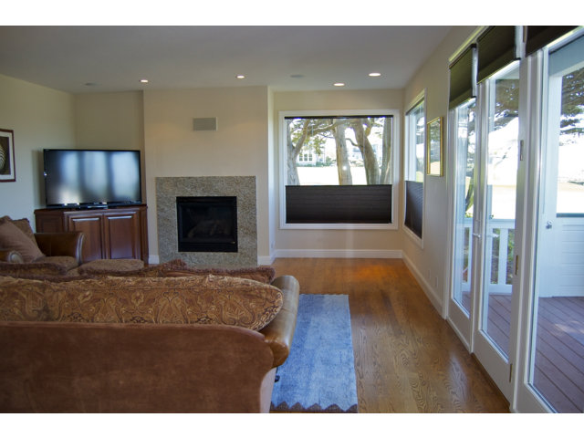 18 Ashdown Place Half Moon Bay, CA 94019 - Photo 7 of 23 a living room with furniture and a flat screen tv