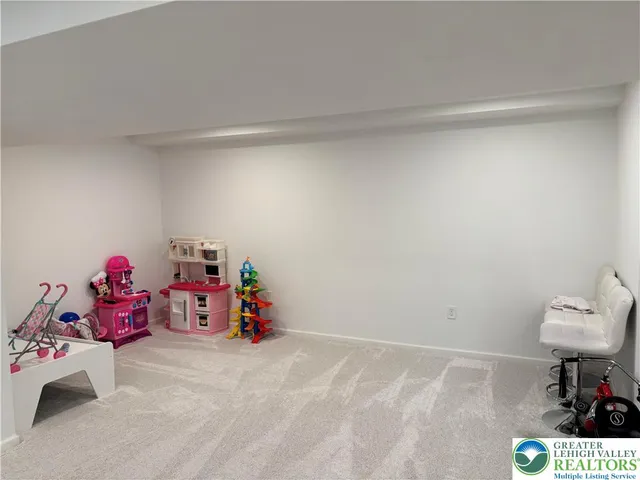 a view of a room with baby toys