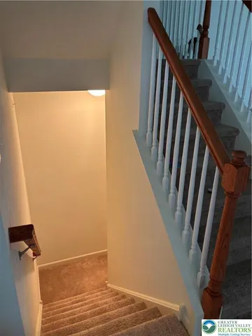 a view of balcony with wooden floor