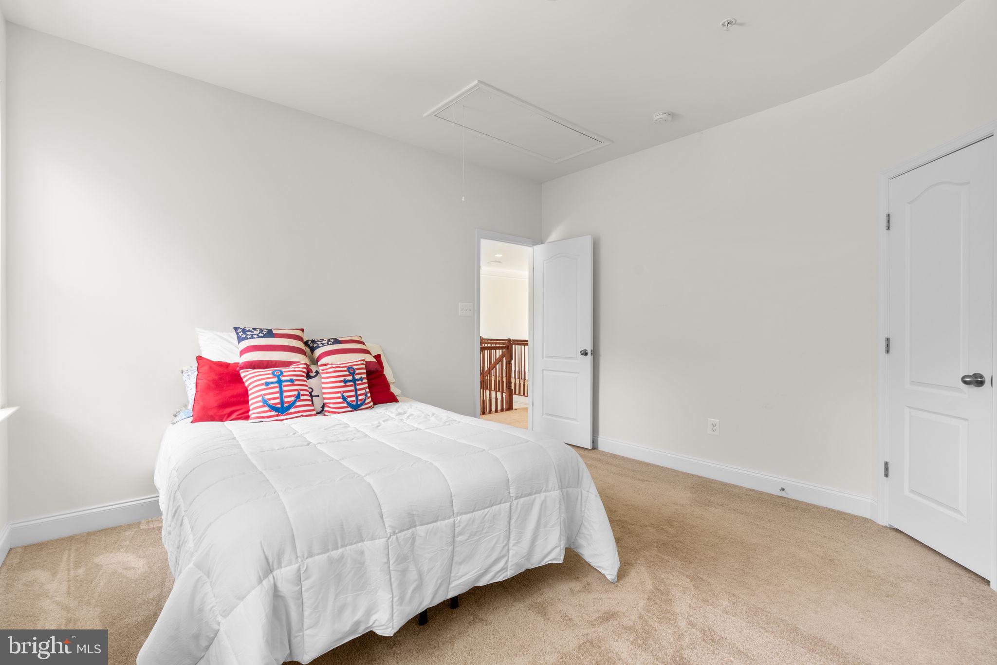 174 Acton Road Annapolis, MD 21403 - Photo 14 of 36 a bedroom with a bed and dresser