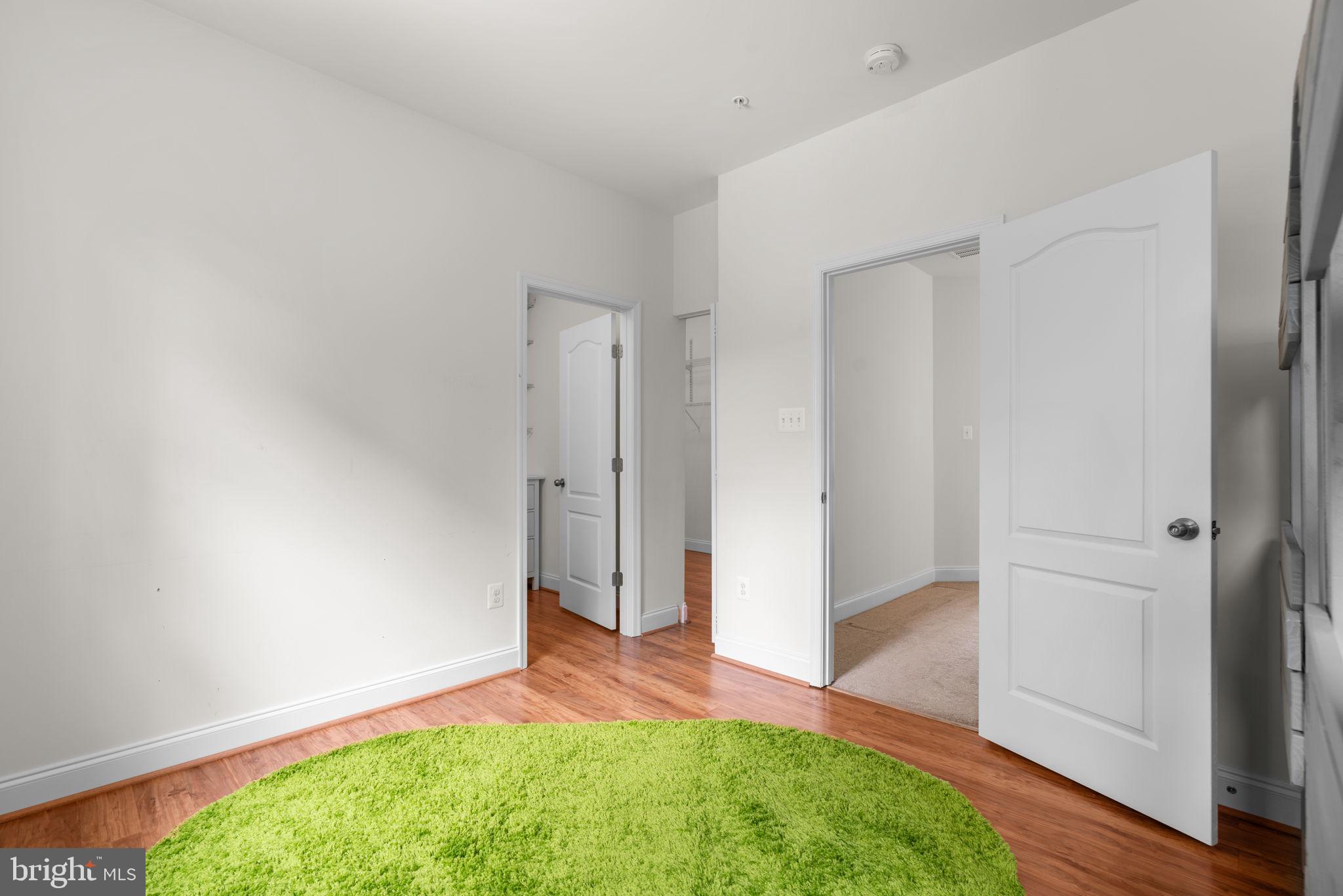 174 Acton Road Annapolis, MD 21403 - Photo 19 of 36 a view of hallway with closet and wooden floor