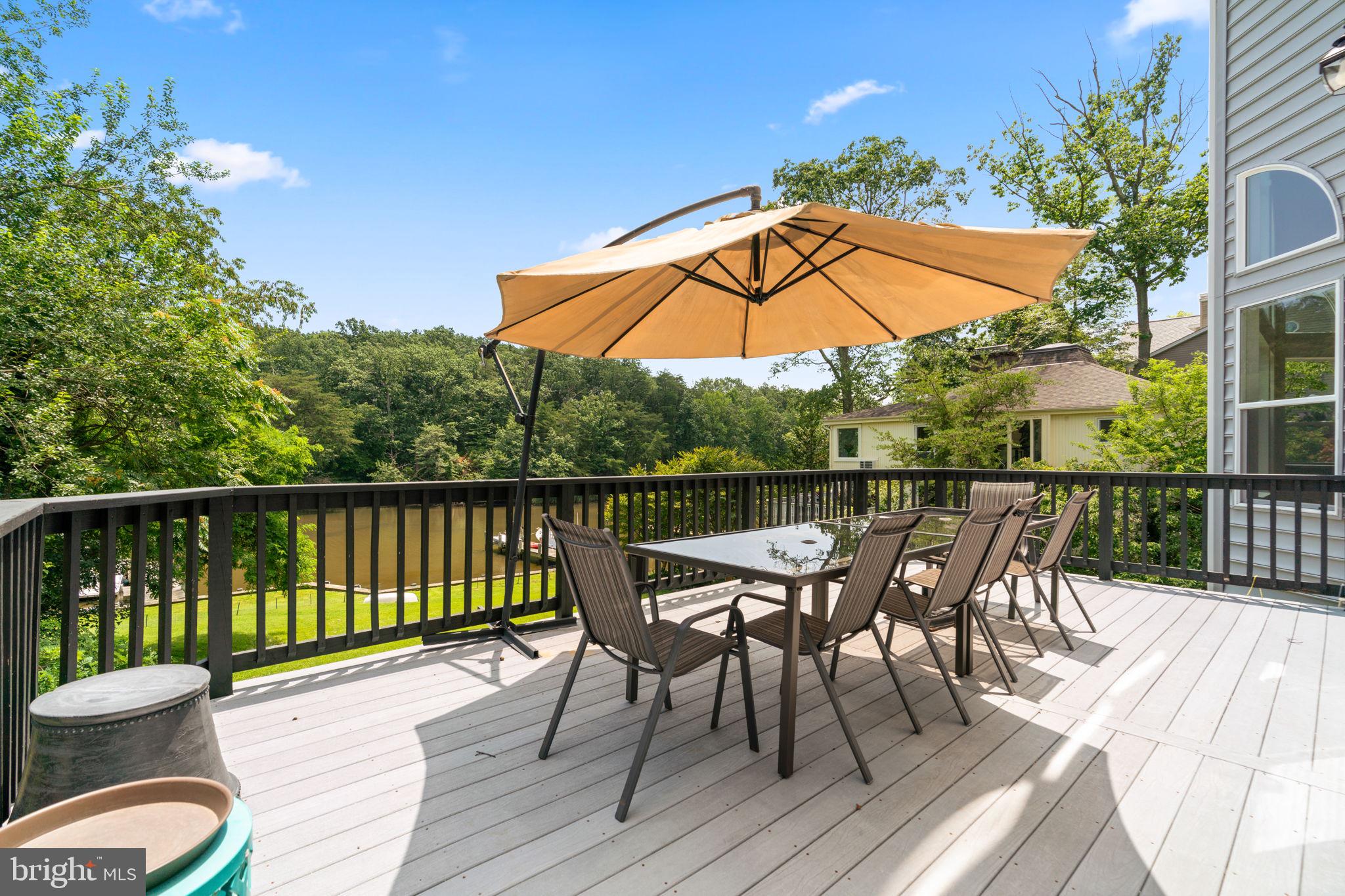 174 Acton Road Annapolis, MD 21403 - Photo 28 of 36 a view of balcony with furniture and wooden floor