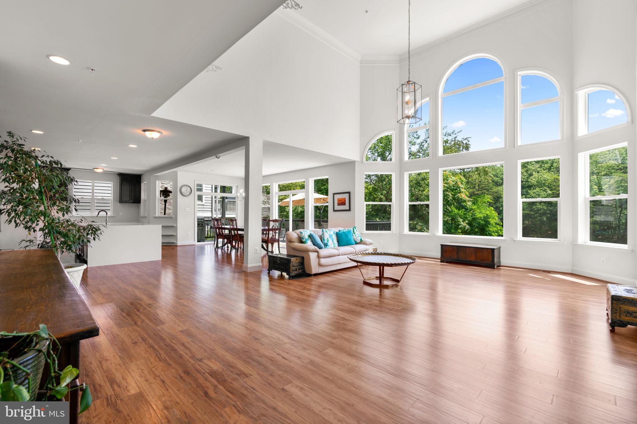 174 Acton Road Annapolis, MD 21403 - Photo 3 of 36 a view of a living room and kitchen with a large window