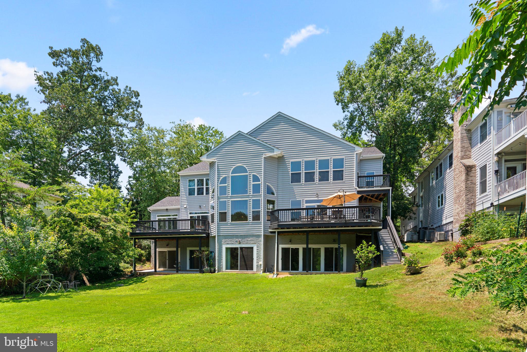 174 Acton Road Annapolis, MD 21403 - Photo 33 of 36 a front view of a house with a garden