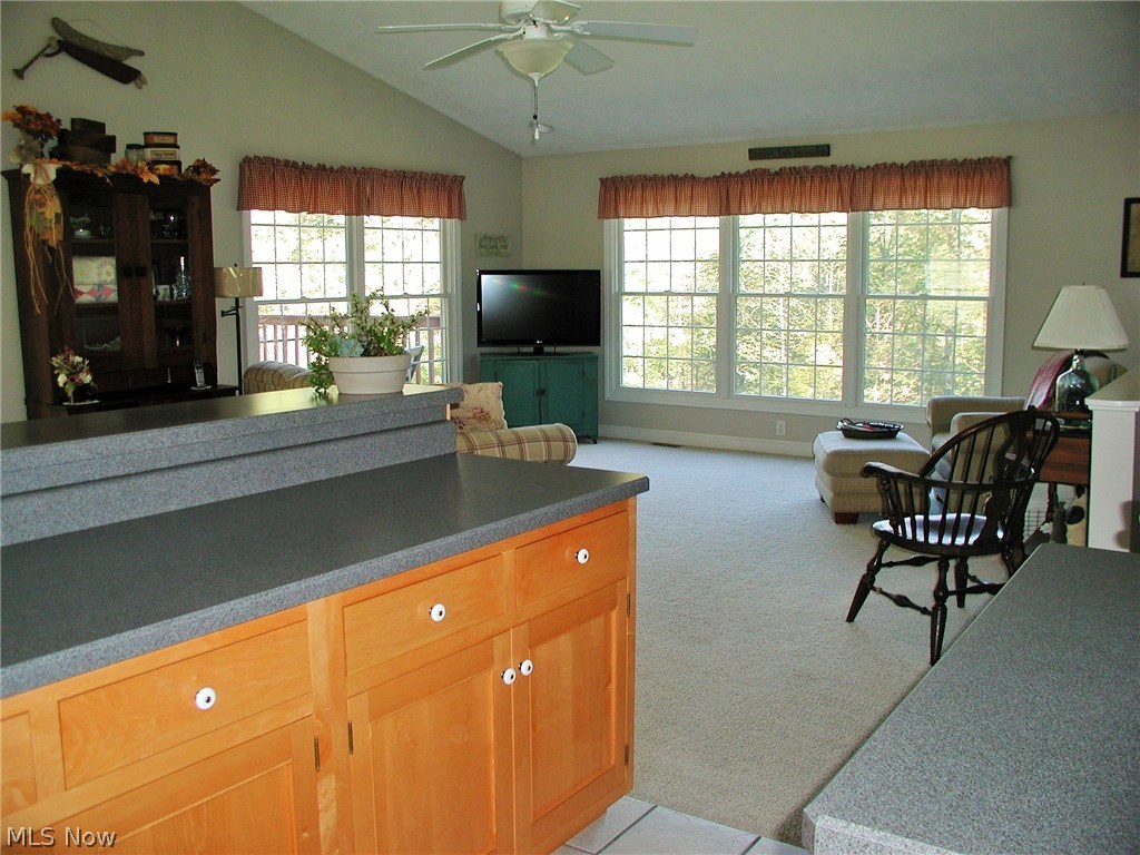 3020 Explorer Road Southwest Carrollton, OH 44615 - Photo 4 of 23 Great room. Great wooded views