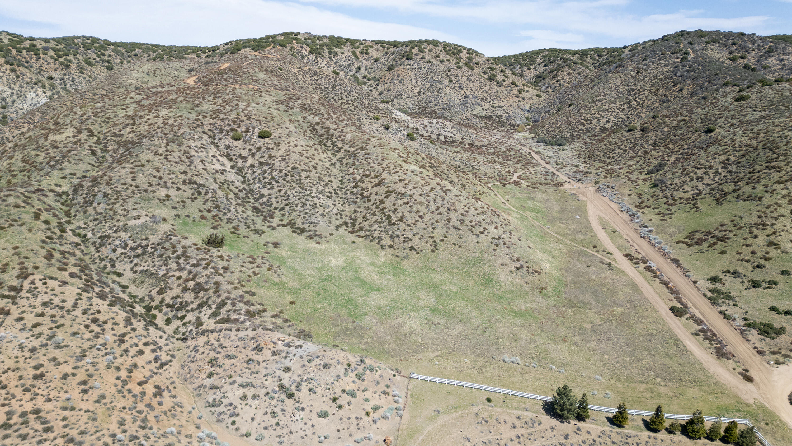 Shallow Springs Road South Palmdale, CA 93551 - Photo 7 of 14 a view of a dry field with mountains in the background