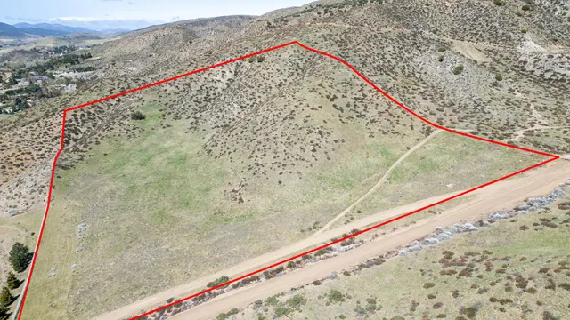 a view of a pool and an outdoor space
