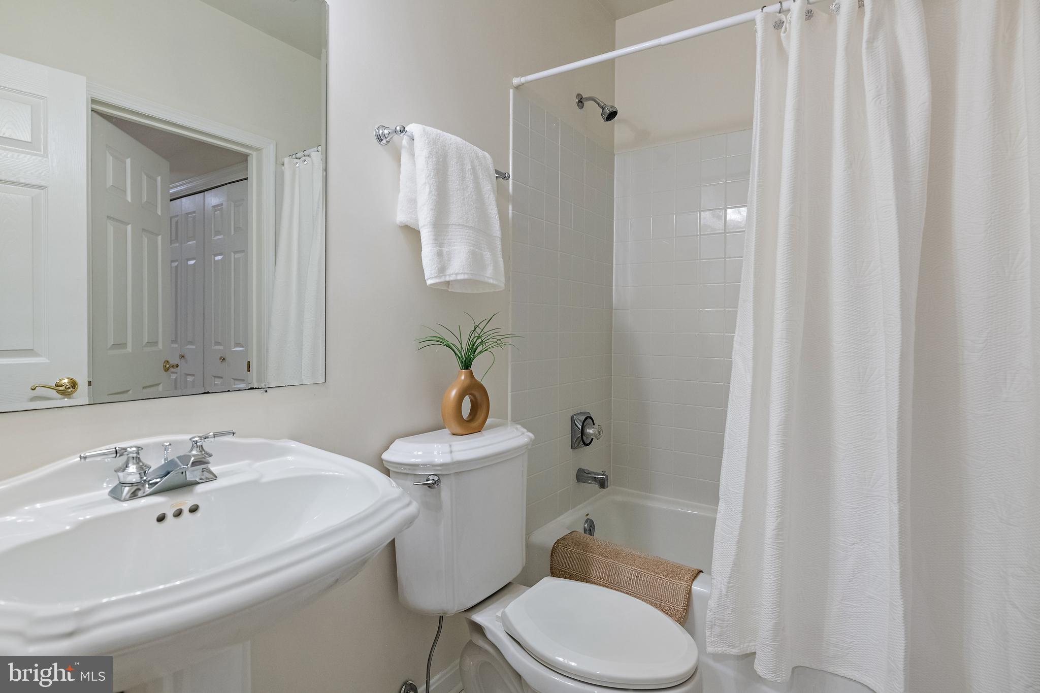 150 South River Landing Road Edgewater, MD 21037 - Photo 39 of 50 a bathroom with a sink toilet and shower