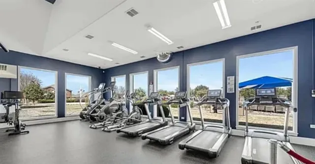 a view of a room with gym equipment