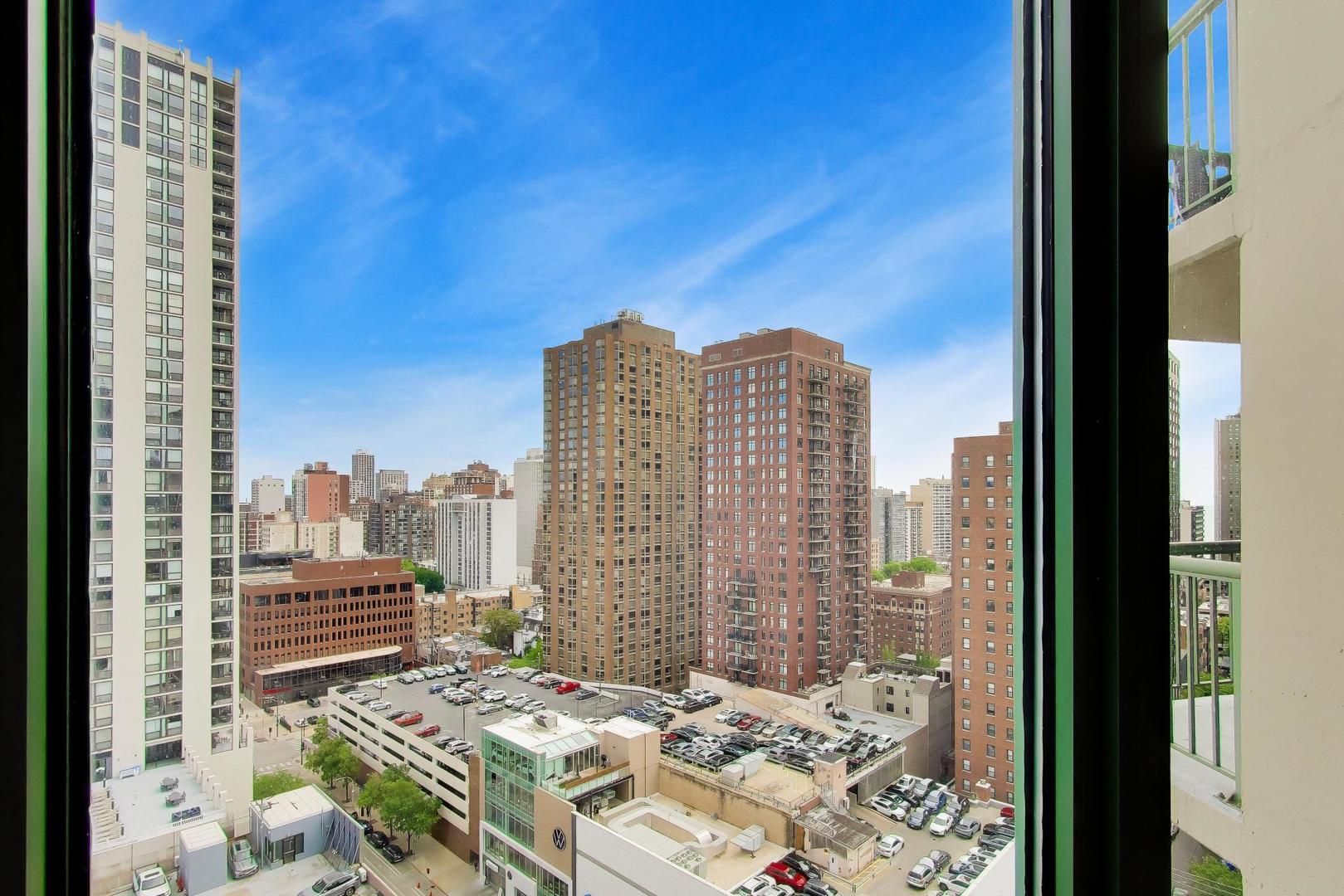 111 West Maple Street, Unit 1503 Chicago, IL 60610 - Photo 22 of 39 a view of a city from a balcony