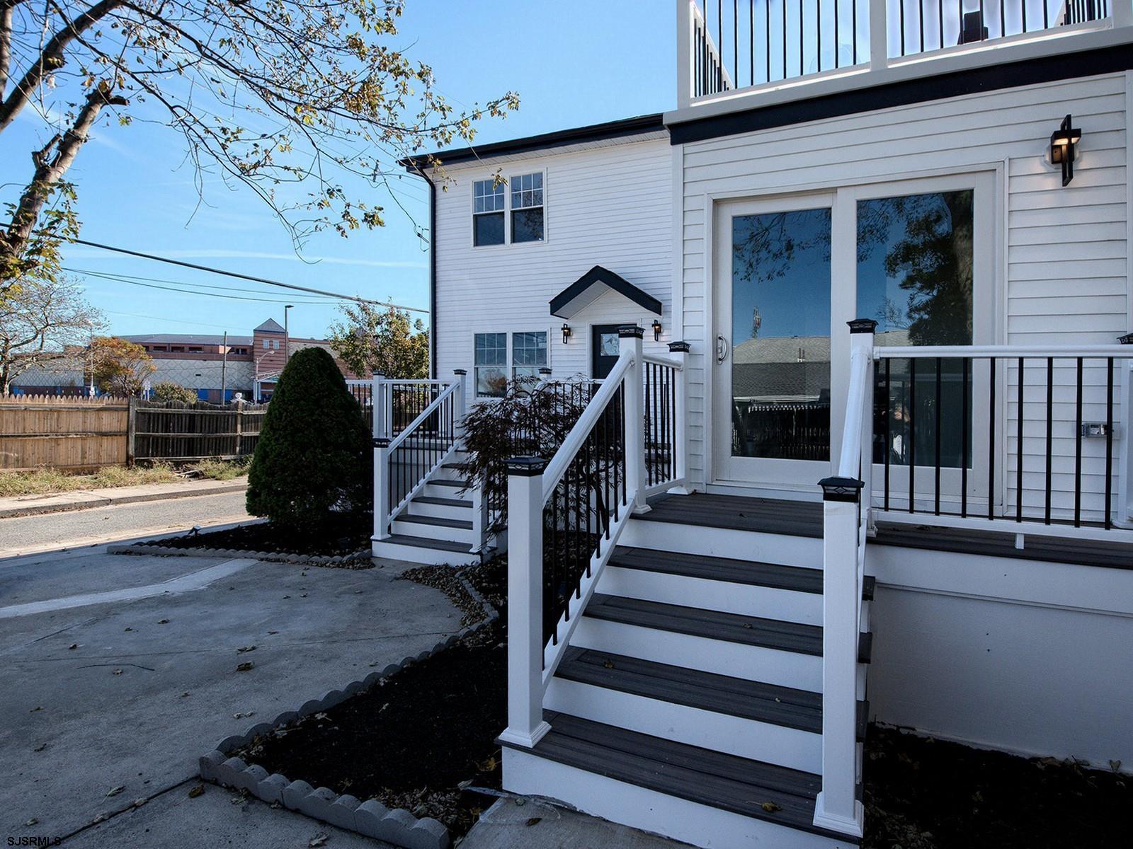 706 Augustine Road Atlantic City, NJ 08401 - Photo 3 of 56 a view of a patio with table and chairs