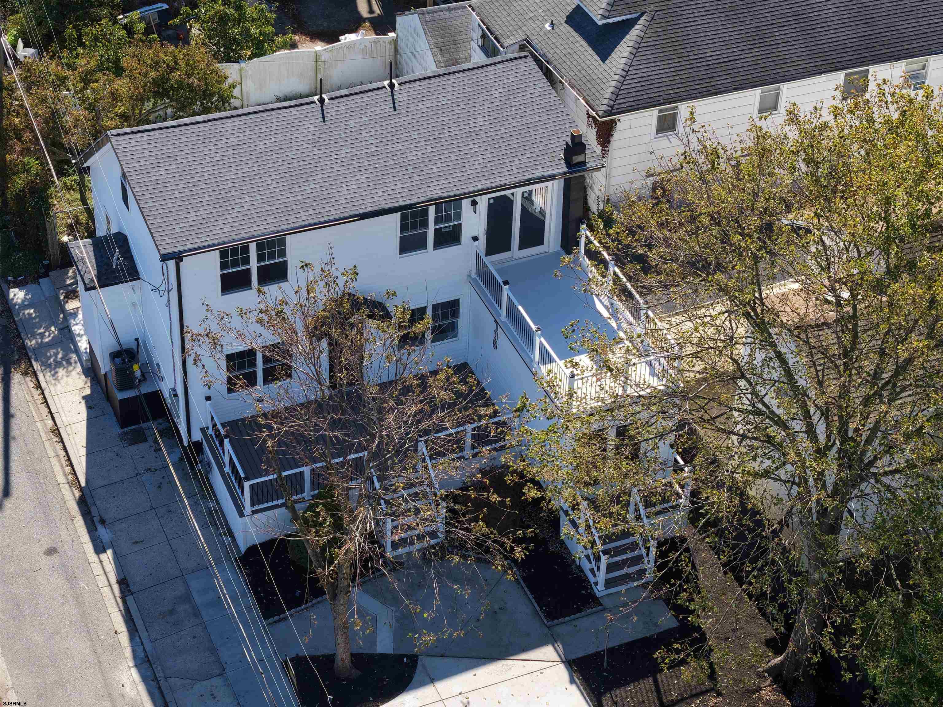 706 Augustine Road Atlantic City, NJ 08401 - Photo 46 of 56 a aerial view of a house with balcony and outdoor seating