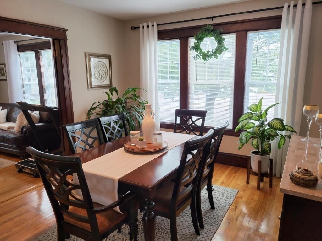 352 Chandler Street, Unit 1 Worcester, MA 01602 - Photo 12 of 23 a view of a dining room with furniture window and wooden floor