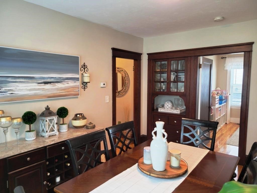 352 Chandler Street, Unit 1 Worcester, MA 01602 - Photo 14 of 23 a kitchen with a table and chairs in it