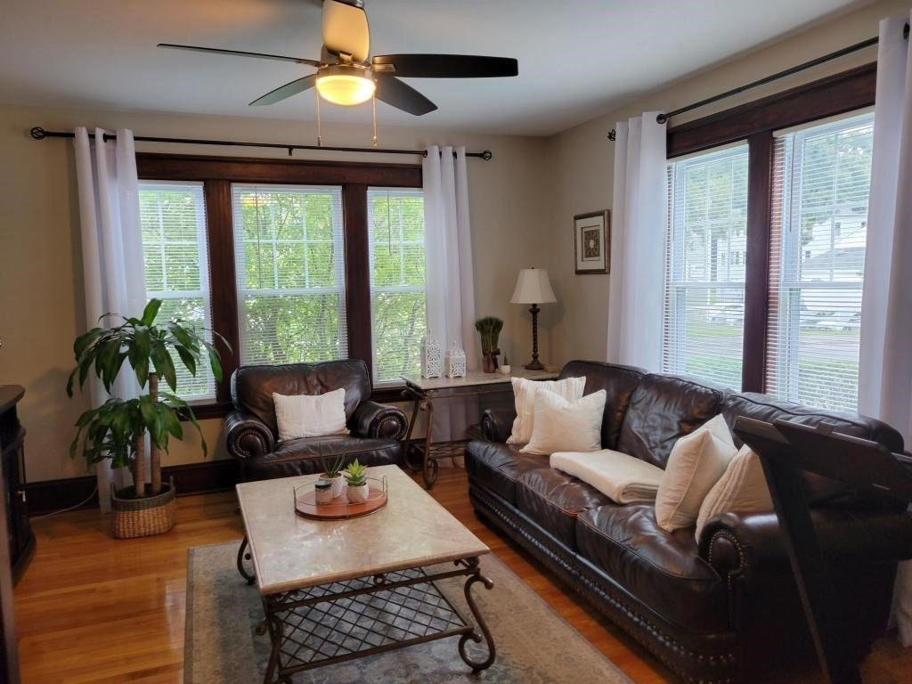 352 Chandler Street, Unit 1 Worcester, MA 01602 - Photo 17 of 23 a living room with furniture and a large window
