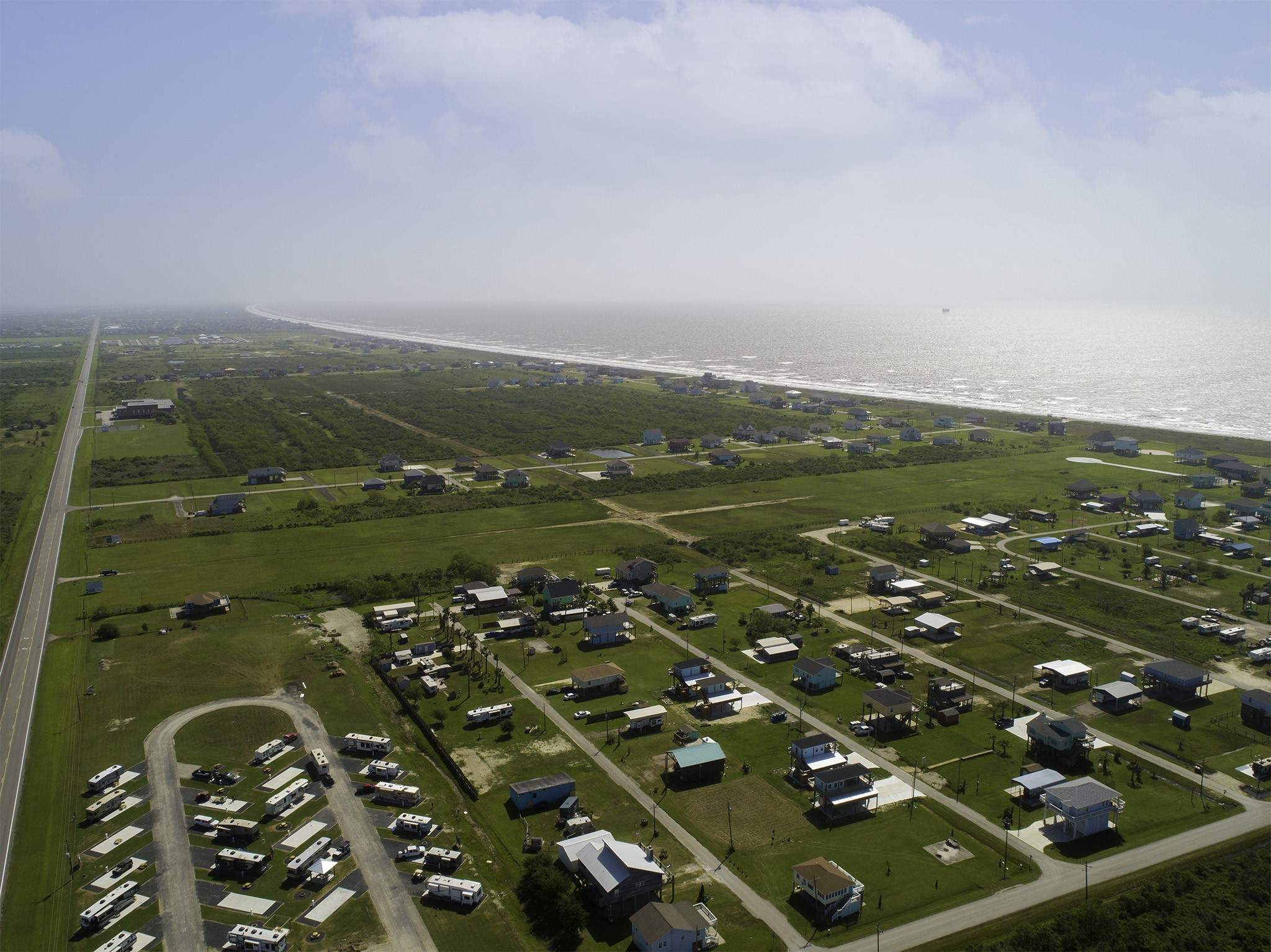 200 State Highway 87 Crystal Beach, TX 77650 - Photo 1 of 10 an aerial view of multiple house