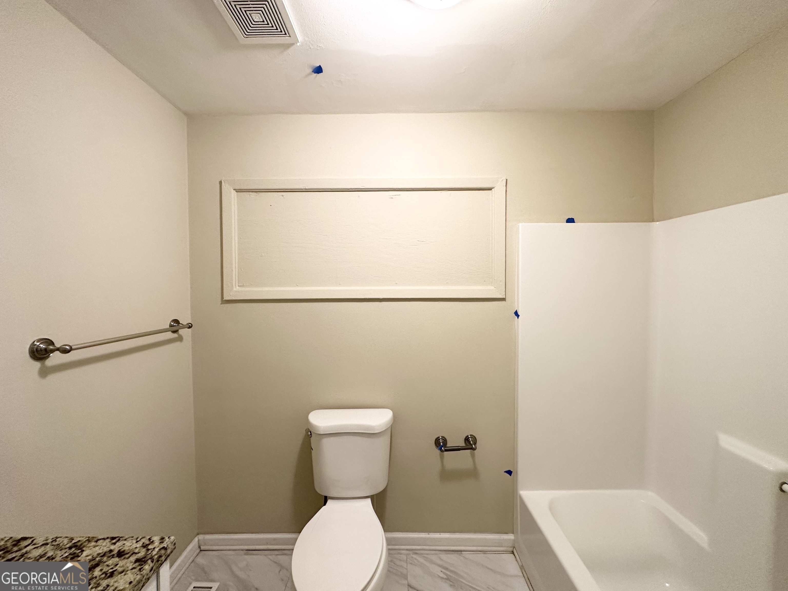 2310 Ousley Court Decatur, GA 30032 - Photo 4 of 11 a bathroom with a toilet and a shower