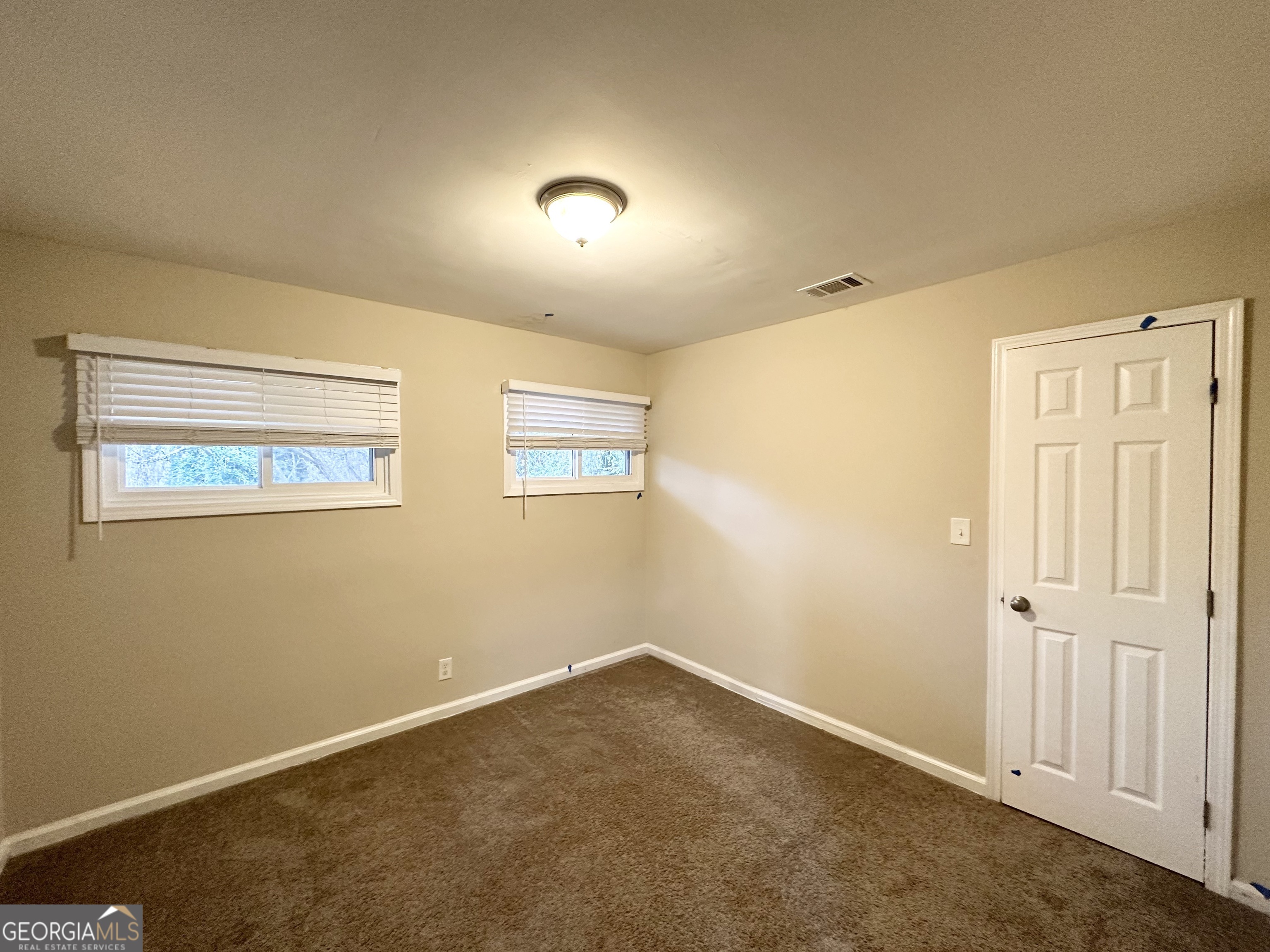 2310 Ousley Court Decatur, GA 30032 - Photo 7 of 11 a view of an empty room