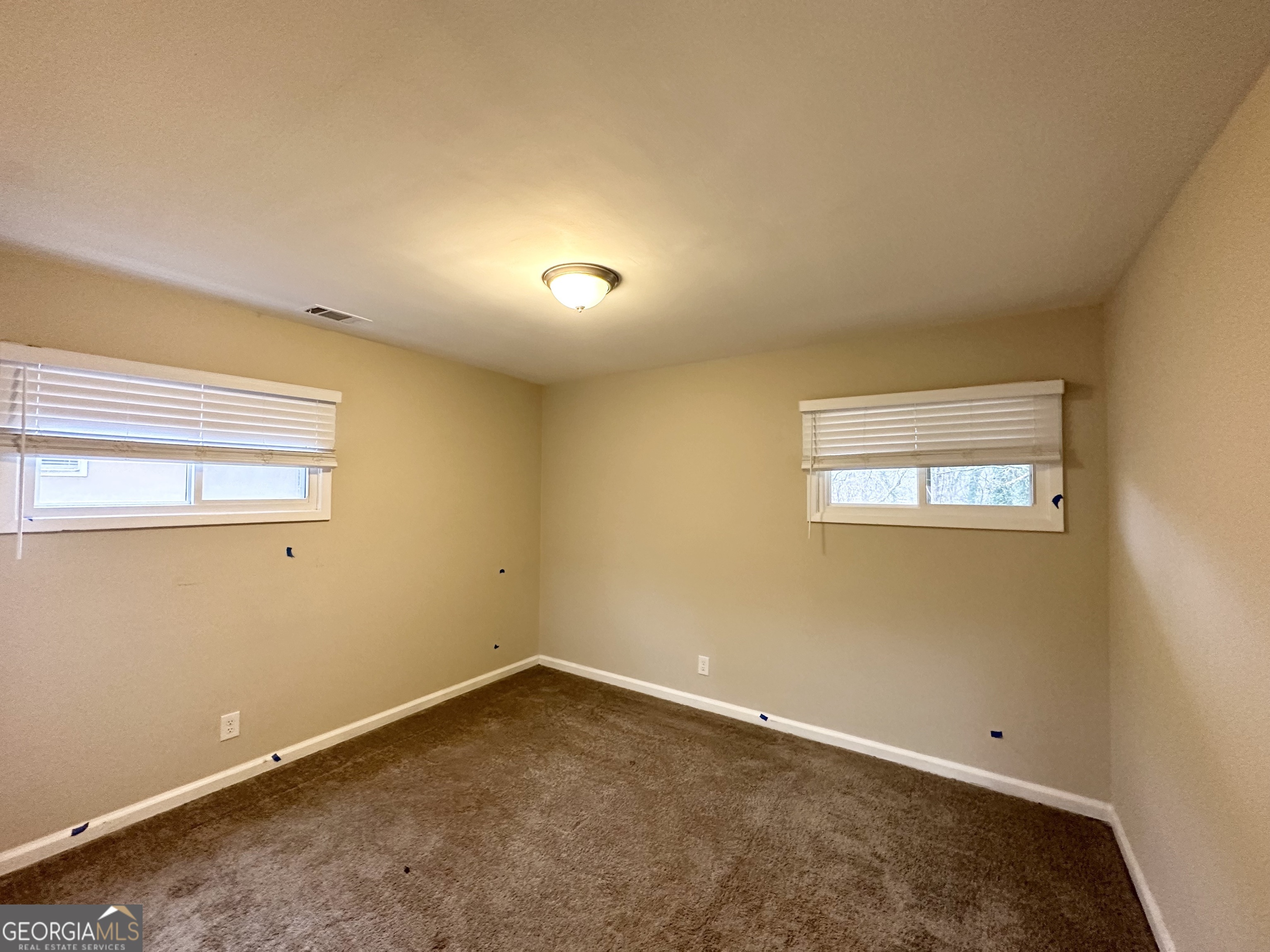 2310 Ousley Court Decatur, GA 30032 - Photo 8 of 11 an empty room with a window