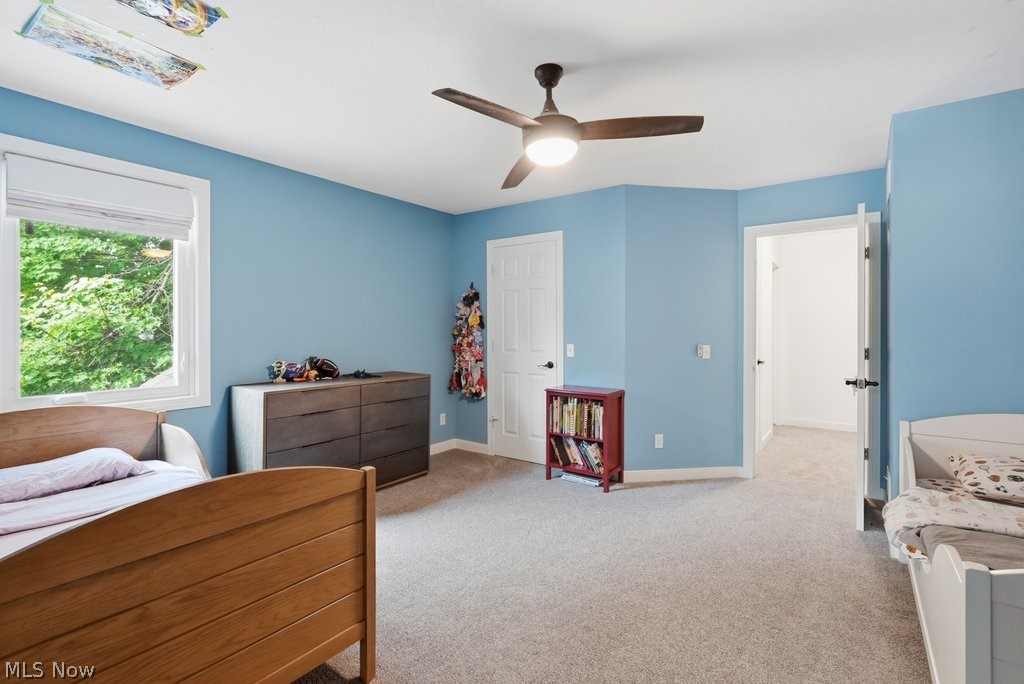 2323 Call Road Stow, OH 44224 - Photo 36 of 42 Carpeted bedroom featuring a ceiling fan with integrated lighting, a window with a white blind, and a durable chest of drawers