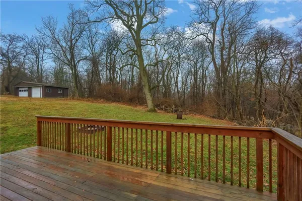 a view of deck and tree