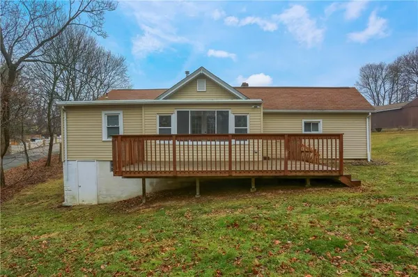a view of a house with a roof deck