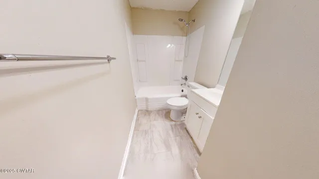 a bathroom with a sink and a toilet