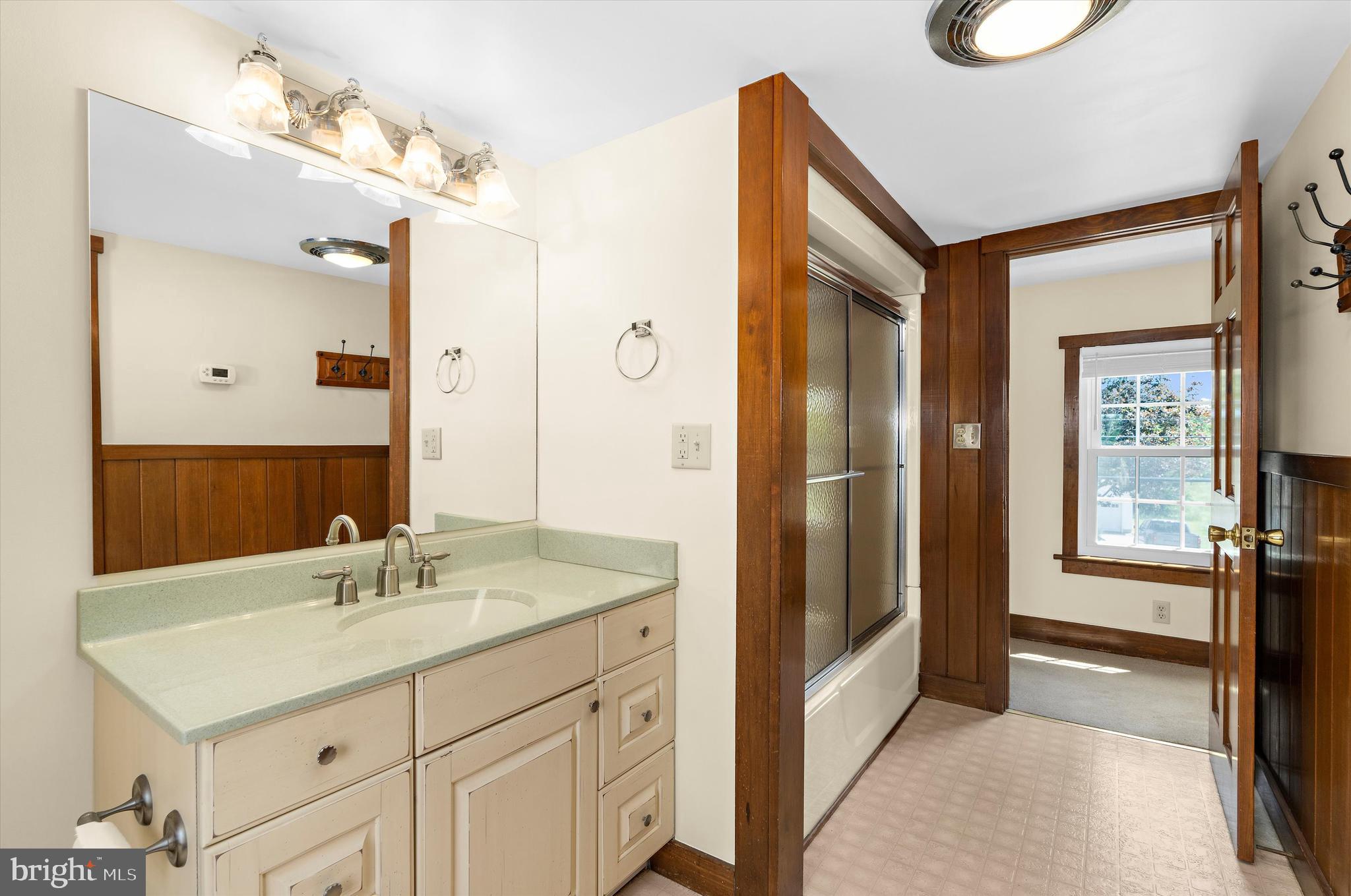12714 Still Pond Road Still Pond, MD 21667 - Photo 18 of 62 a bathroom with a sink vanity tub and a mirror