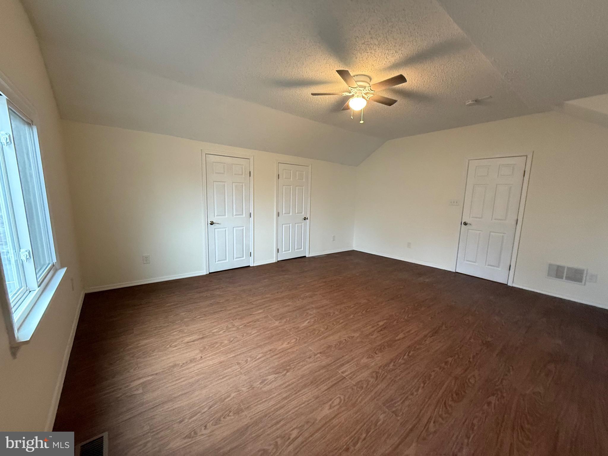 272 Shell Road Carneys Point, NJ 08069 - Photo 11 of 14 wooden floor in an empty room with a window