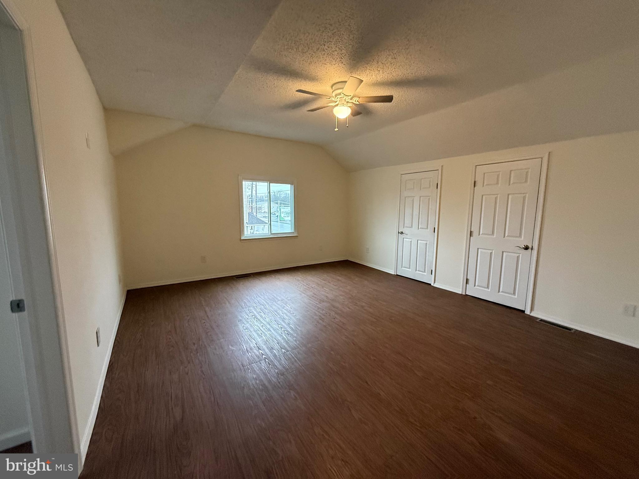 272 Shell Road Carneys Point, NJ 08069 - Photo 10 of 14 a view of an empty room with wooden floor and a window