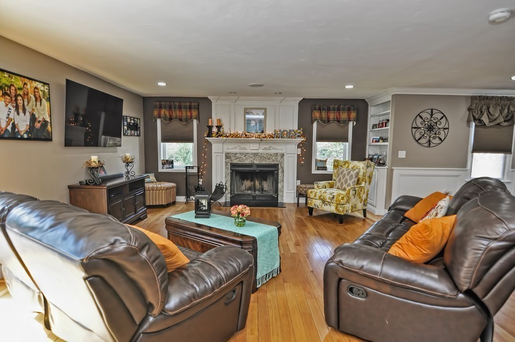 14 Talbot Drive Norton, MA 02766 - Photo 12 of 30 a living room with furniture and a fireplace